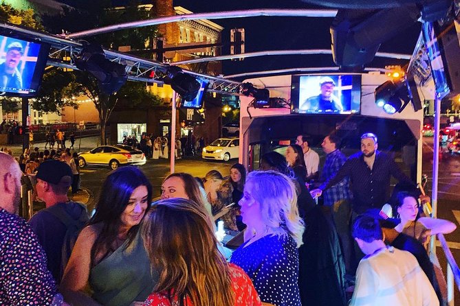 Open Air Party Bus with DJ & Bartender 21+ - DJ, Bartender, and 8 TVs: The Onboard Vibe