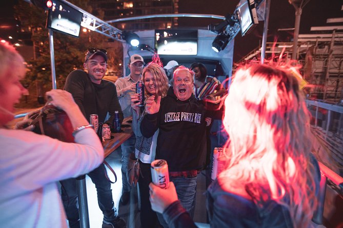 Private Open Air Party Bus with DJ & Bartender 21+ - Onboard Entertainment: DJ, Seven Music-Video Screens, and the Vibe